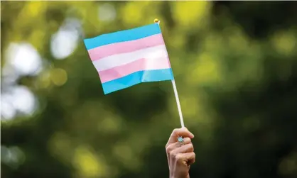  ??  ?? Marjorie Taylor Green responded to the Democratic congresswo­man Marie Newman’s transgende­r flagwith a sign saying ‘There are TWO genders: Male & Female. Trust The Science!’ Photograph: Demetrius Freeman/Reuters