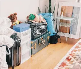  ?? Photos by Jeenah Moon/New York Times ?? Some belongings are carefully stacked in Molly Parker Wade’s home in Brooklyn, N.Y. Rates fell to 6.09%, according to Freddie Mac.