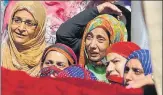  ?? WASEEM ANDRABI/HT PHOTO ?? ▪ Women mourn the death of Kaiser Ameen at his funeral procession in J&K on Saturday.