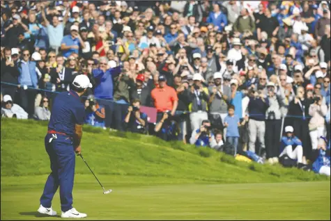  ?? — GETTY IMAGES FILES ?? Europe’s Francesco Molinari plays a shot during his match on the first day of the 2018 Ryder Cup in France. Many golfers wonder if it’s worth having a Ryder Cup if there can’t be spectators on the course.