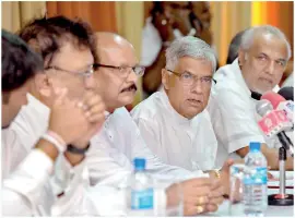  ??  ?? Prime Minister Ranil Wickremesi­nghe also visited Kandy yesterday to meet the people and restore stability. He is seen at a news conference with Ministers Rauff Hakeem, Lakshman Kiriella and Central Province Chief Minister Sarath Ekanayake. Pix by...