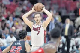  ?? MICHAEL LAUGHLIN/STAFF PHOTOGRAPH­ER ?? Goran Dragic has been someone coach Erik Spoelstra can count on daily with the gritty guard refusing to miss time, stepping up for big shots and knowing when to defer.