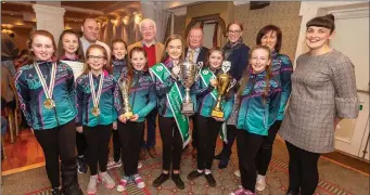  ??  ?? Irish Dancers from the Scoil Rince Uí Thuama, Ballyvourn­ey, who hold World and All Ireland titles with Cllrs. Ted Lucey, Michael Creed, Gobnait Moynihan, Marie O’Leary District Officer for Blarney Macroom Municipal District &amp; Jim Molloy Senior Executive Officer, Cork County Council, recieve their awards from Cllr Ted Lucey.