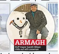  ??  ?? ARMAGH DUP mayor Gareth Wilson chills out with snowman