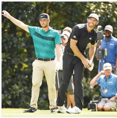  ??  ?? CO-LEADERS: Dustin Johnson, right, tees off and Kevin Chappell (left) reacts on the 17th tee during the third round of the Tour Championsh­ip at East Lake Golf Club on Saturday. (USA TODAY Sports)