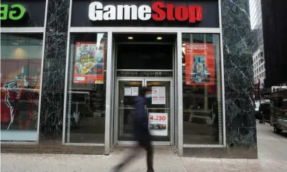  ??  ?? ‘This week the share price of a company called GameStop became a battlegrou­nd.’ Photograph: Carlo Allegri/Reuters