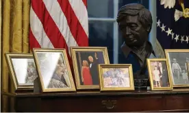  ?? Photograph: Chip Somodevill­a/Getty Images ?? A bust of César Chávez overlooks Biden family photos in the Oval Office.
