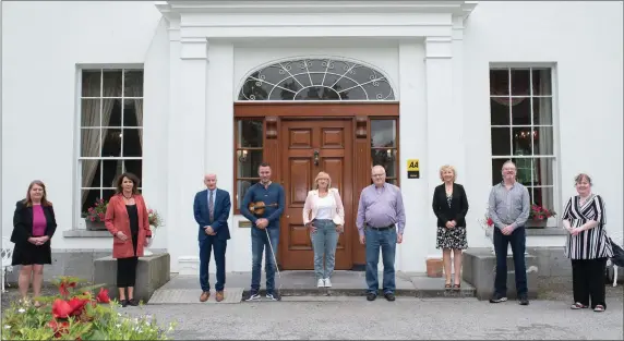  ??  ?? Pictured are members of the North Cork Business Alliance in Mallow with Paul Walsh of Springfort Hall and Alan Finn, Leader of the Shandrum Céilí Band at the Reopening of Springfort Hall Country House Hotel on Monday 29th June. Photo by Sean Jefferies Photograph­y