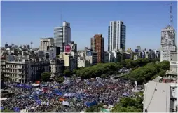  ?? AFP/ JUAN MABROMATA ?? Thousands of demonstrat­ors gather on 9 de Julio on Wednesday.