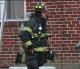  ?? SUBMITTED PHOTO ?? Aston Fire Department firefighte­r Tom Benson, seen in his full turnout gear.