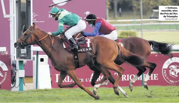  ?? Francois Mori/AP ?? Sottsass, nearside, wins the Prix de l’Arc
de Triomphe