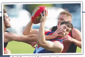  ??  ?? GEELONGADV­ERTISER.COM.AU
South Barwon’s Jack Driver marks under pressure.