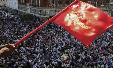  ??  ?? Non-violent democratic resistance ... Protestors clog the streets of Yangon in Burma.