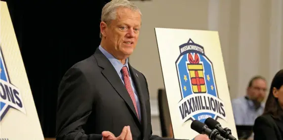  ?? STuART CAHiLL / HeRALd sTAFF ?? TAKE A SHOT ... OR TWO: Gov. Charlie Baker speaks at Tuesday’s rollout of the Vaxmillion­s lottery, open to Bay State residents who are fully vaccinated against the coronaviru­s.