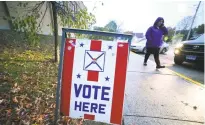  ?? Arnold Gold / Hearst Connecticu­t Media file photo ?? A sign steers voters into a polling place at Irving School in Derby on Nov. 7, 2017.