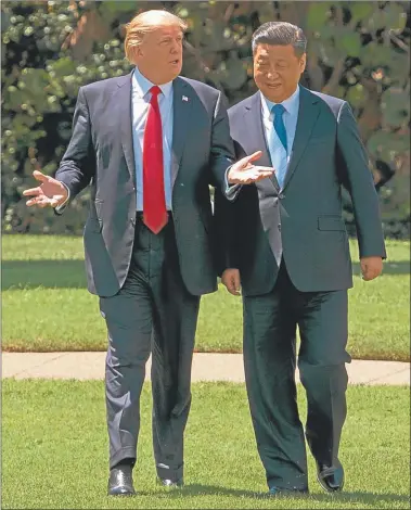  ?? AFP ?? MANO A MANO. Los presidente­s de Estados Unidos y China se vieron cara a cara por primera vez.