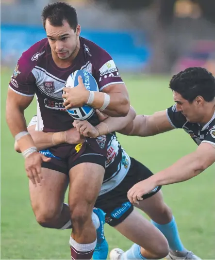  ?? Picture: STEVE HOLLAND ?? Tweed’s Kalani Going closes in on a tackle on Burleigh's Hayden Hansen in the Seagulls’ 20-18 win.