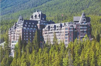  ?? GAVIN YOUNG ?? The historic Banff Springs Hotel will have a single entrance for guests, and gift baskets in rooms with sanitizers, wipes and masks when it reopens.