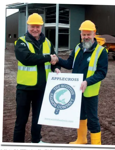  ??  ?? Above: Anderson with SSC recirculat­ion project manager Richard Polanski in April, announcing £10 milllion investment in new freshwater facilities in Applecross