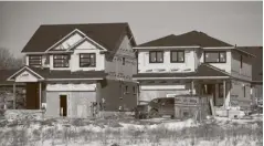  ?? Julian Gavaghan ?? Two houses being built on South Parkwood Boulevard in Elmira are among the 886 Woolwich hopes will be built in the township within three years.