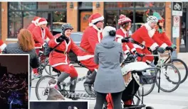  ?? MILWAUKEE JOURNAL SENTINEL ?? Santas take to the streets bybike for the annual Santa Cycle Rampage