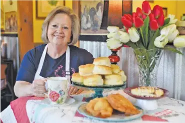  ?? STAFF PHOTOS BY MATT HAMILTON ?? Phyllis Cabe Blevins takes a coffee break at The Big Biscuit Barn in Rossville, Ga.