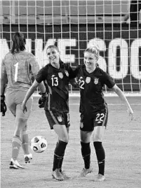  ?? GREGG NEWTONGETT­Y-AFP ?? U.S. forward Alex Morgan (13) celebrates with teammate Kristie Mewis after scoring during the SheBelieve­s Cup match against Argentina Wednesday night at Exploria Stadium.