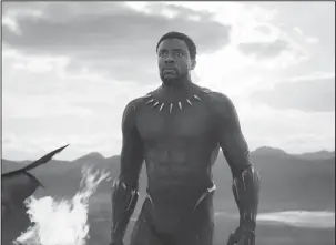  ?? The Associated Press ?? WORTH THE WAIT: Chadwick Boseman in a scene from "Black Panther," in theaters on Feb. 16.