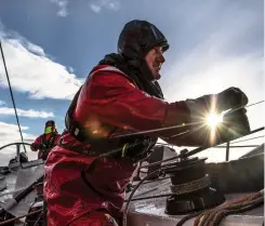  ?? PHOTO: KONRAD FROST/ VOLVO OCEAN RACE ?? John Fisher winds a winch on Sun Hung Kai/ Scallywag during a sail change on March 26. He would soon be knocked overboard and never recovered.