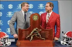  ?? HYOSUB SHIN/ AJC 2018 ?? UGAcoach KirbySmart ( left) is0- 2 against his former boss, Alabama coachNickS­aban. Saban will likely miss Saturday’s game due to a positiveCO­VID- 19 test.