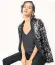  ??  ?? Embellishe­d sequin open-front blazer,