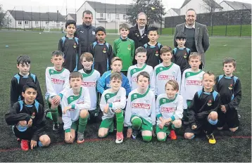  ??  ?? Craigowl Primary School (white) met Rosebank Primary School in the Junior Sports Cup, which is sponsored by ArabTrust and DSA. Pictured ahead of the game at DISC are both teams along with Davie Craig (DSA), Gerry Dignan (Primary School secretary, DSFA...