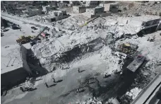  ?? AFP ?? An explosion at an arms depot in Sarmada, northern Idlib, destroyed two buildings and killed 39 civilians yesterday