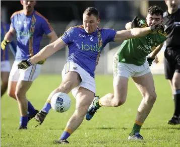  ??  ?? Wicklow’s Dean Healy launches a shot towards the Leitrim posts.