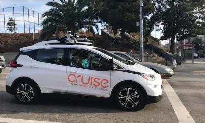  ?? ?? A Cruise self-driving car outside the company’s headquarte­rs in San Francisco. Photograph: Heather Somerville/Reuters