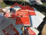  ?? EVAN BRANDT — DIGITAL FIRST MEDIA ?? Nurses and other medical profession­als, who have been working without a contract for 20 months, conducted an informatio­nal picket in front of Pottstown Hospital and had no shortage of signs to choose from.