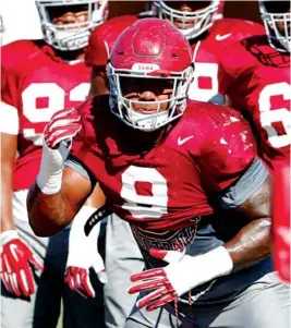  ?? KENT GIDLEY/ALABAMA PHOTO ?? Alabama senior defensive lineman Da’Shawn Hand goes through a drill Thursday afternoon, when the top-ranked Crimson Tide turned their attention to their opener against No. 3 Florida State.