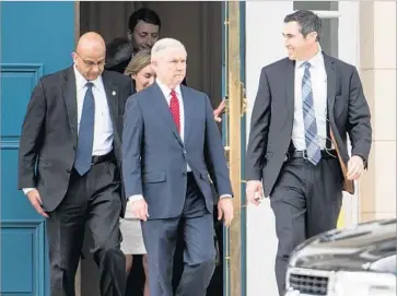  ?? Sean Rayford Getty Images ?? A SPOKESWOMA­N for U.S. Atty. Gen. Jeff Sessions, center, denies that he met privately last year at a Washington hotel with Russia’s U.S. ambassador. Sessions has acknowledg­ed two other meetings with the envoy.