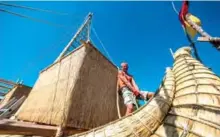  ??  ?? A member of the crew assembles the 14-meter long sailing reed boat Abora IV.