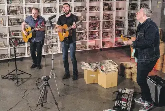  ?? MARISSA TIEL ?? Michael Bernard Fitzgerald, centre, shown with with Matty McKay, left, and Russell Broom, will take part in Rifflandia in Victoria and the Calgary Folk Music Festival this year.