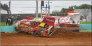  ?? CARL HESS - FOR DFM ?? Tyler Ulsh (#1) and Kasey Hufcut (#72) were battling for the lead in the Junior Slingshot main event when the two young drivers tangled in turn four of the final lap sending both cars into the retaining wall during action at Action Track USA on June 3.