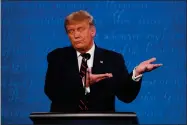  ?? AP PHOTO BY JULIO CORTEZ ?? President Donald Trump gestures while speaking during the first presidenti­al debate Tuesday, Sept. 29, at Case Western University and Cleveland Clinic, in Cleveland, Ohio.