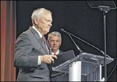  ?? ANDRES / BANDRES@AJC.COM ?? Gov. Nathan Deal acknowledg­es applause after making his remarks at the Georgia Chamber’s annual Eggs & Issues breakfast. Opponents of last year’s HB 757 point to Indiana and North Carolina as cautionary tales.