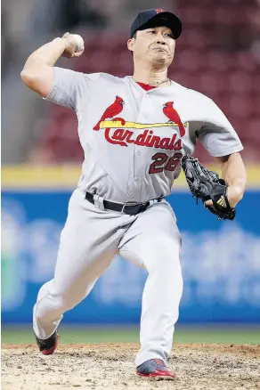  ?? JOE ROBBINS / GETTY IMAGES FILES ?? Seasoned internatio­nal relief pitcher Seung-hwan Oh figures to be pencilled into the setup role in Toronto.