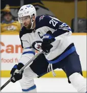  ?? MARK ZALESKI – THE ASSOCIATED PRESS ?? Blake Wheeler had a hand in every goal as the Winnipeg Jets beat the Nashville Predators 5-0 on Saturday. He scored twice and assisted on the other three goals.