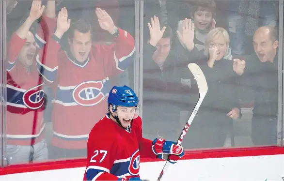  ?? DARIO AYALA/FILES ?? Fans celebratin­g a goal by the Montreal Canadiens’ Alex Galchenyuk could be under cardiovasc­ular stress, according to a recent study.
