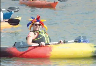  ?? NEWS PHOTO MO CRANKER ?? Ang Turner sports a crazy hat during last year’s Hat, Hat Regatta. The event is running again this weekend and is expected to have more than 100 people taking part.