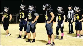  ?? MARK HUMPHREY ENTERPRISE-LEADER ?? Prairie Grove’s junior high defense stands ready and waiting for play to resume following a time-out. The junior Tigers defeated Shiloh Christian, 36-0, in a rare mercy-rule victory over the junior Saints on Thursday, Oct. 3.