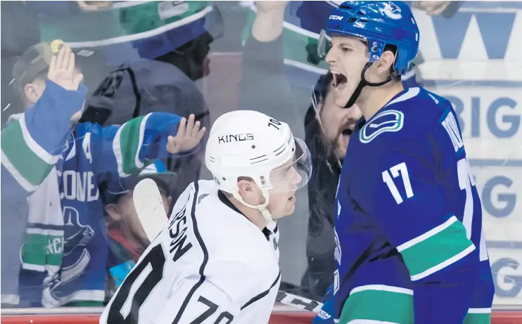  ?? — THE CANADIAN PRESS FILES ?? Who has stepped up in the absence of Bo Horvat? Defensivel­y, head coach Travis Green says Nic Dowd, right, has been the best of the Canucks.