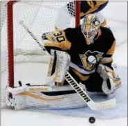  ?? KEITH SRAKOCIC — THE ASSOCIATED PRESS FILE ?? In this Oct. 7 photo, Pittsburgh Penguins goalie Matt Murray (30) makes a save in the third period against the Nashville Predators during an NHL hockey game, in Pittsburgh.